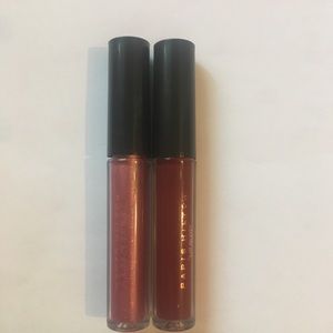 Pairs Hilton lip glosses